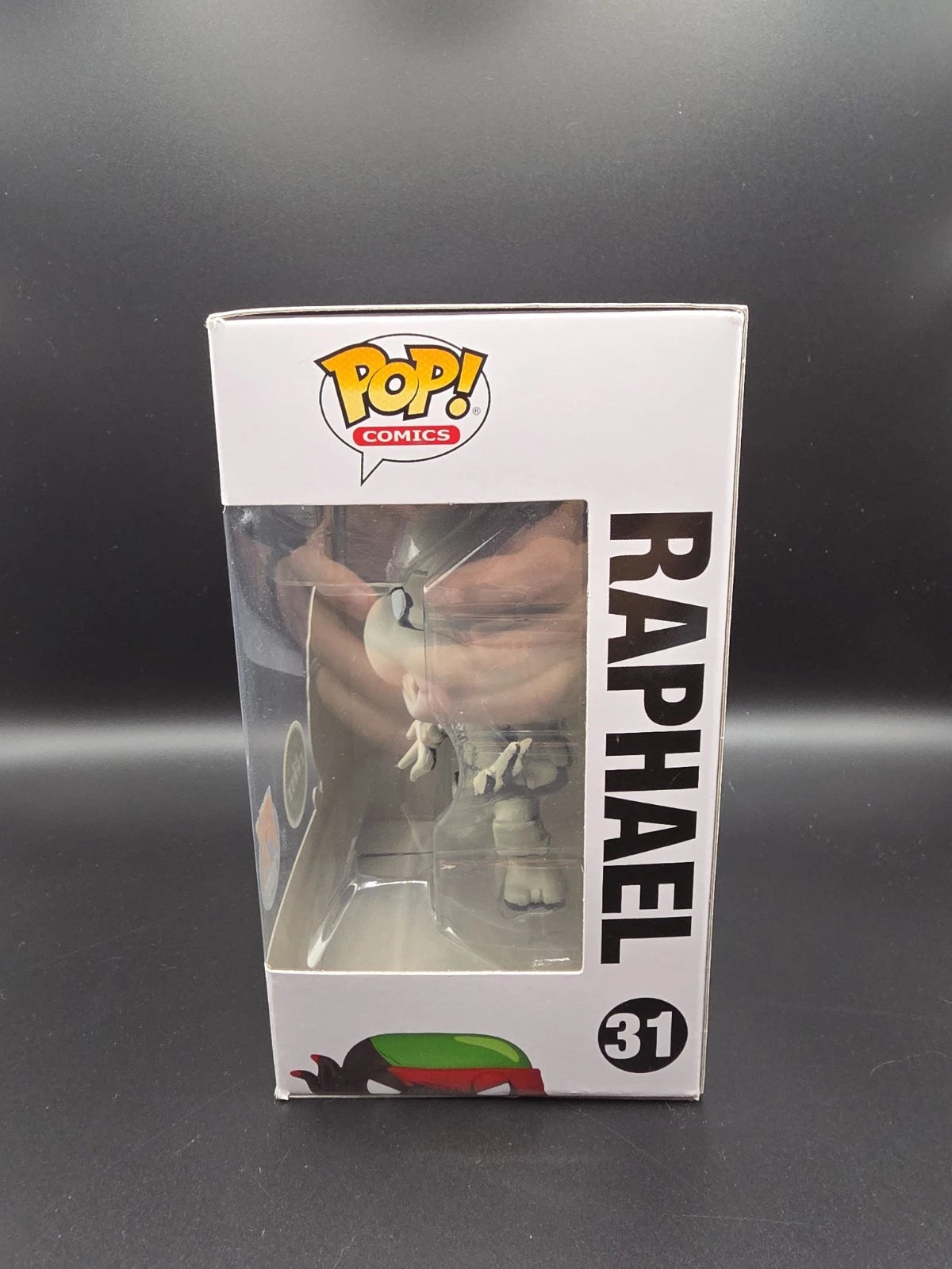 Funko Pop! Teenage Mutant Ninja Turtles: Raphael #31 (Black & White Chase Variant, PX Previews Exclusive + Wall Mount) - Grown Up Kids