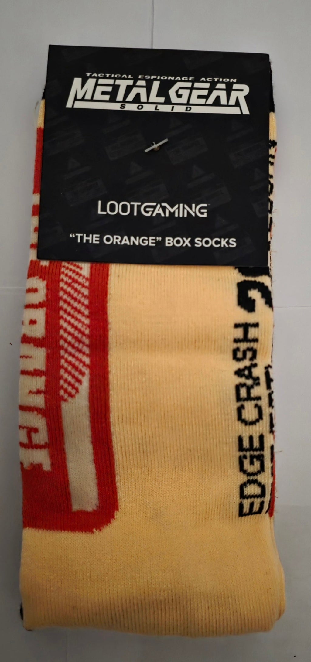 Metal Gear Solid "The Orange" Cardboard Box Crew Socks (Loot Gaming Exclusive) - Grown Up Kids