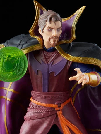 Figure in purple and gold costume with green gem, against a black background