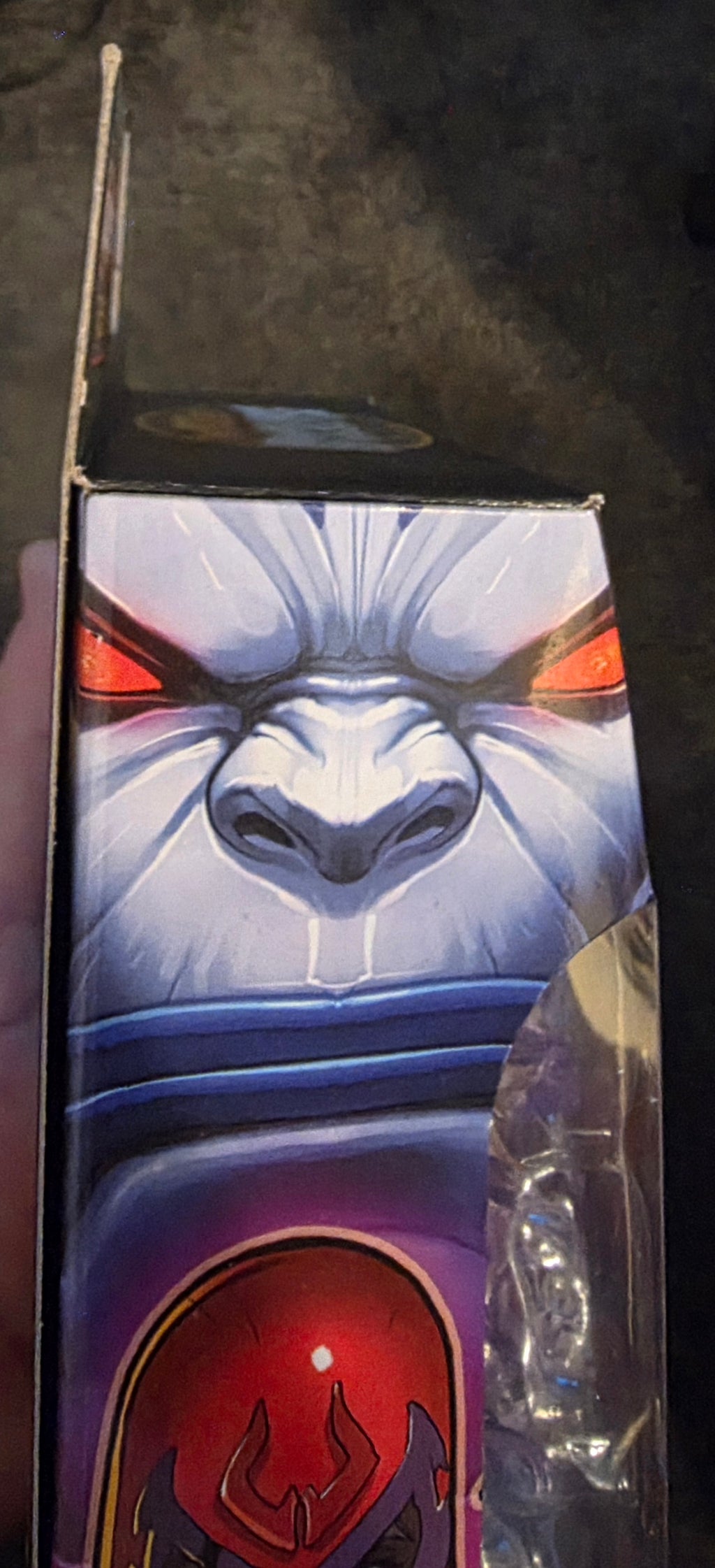 Box with a stylized gorilla face design on a dark background